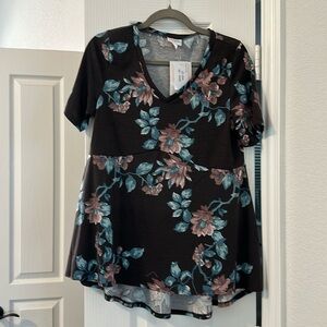NWT XS LuLaRoe Jana A line top. Black background with floral print